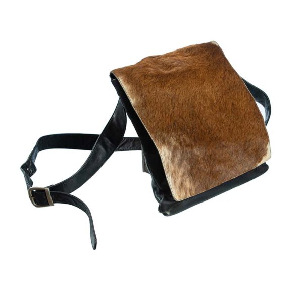 Vintage schoudertas met koeienvel